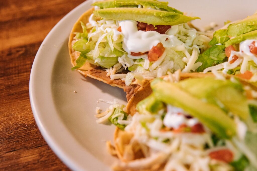 Tacos with avocados in a ceramic plate. Image source: Pexels